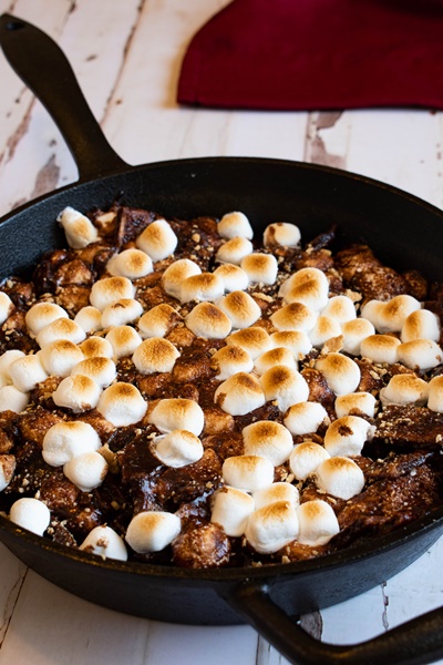smores in a pan with red linen