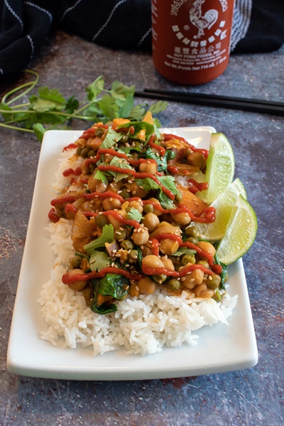 Creamy Thai inspired Chickpea Sweet Potato Stew with spicy sauce