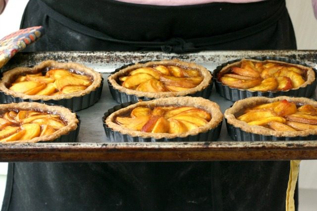 Molasses peach tarts are especially delicious - like a mouthful of summer in every bite. And you can't beat the texture. Flaky pastry and tender peaches sweetened only with a bit of honey and molasses. These aren't drippy either so the pastry doesn't go soggy.