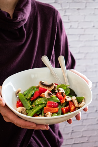 bowl of salad with red pepper