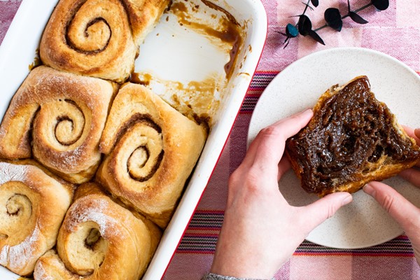 molasses sticky buns with hands