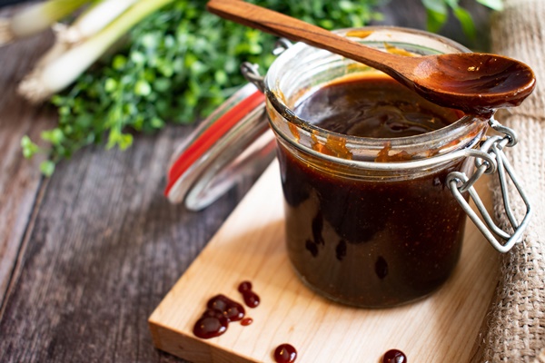 Flawless bbq sauce with wooden spoon