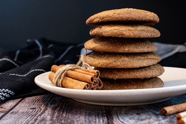  Soft and Chewy Blackstrap Molasses Cookies on a plate with cinnamon 